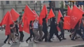 Demonstrators are seen carrying flags with the hammer and sickle through the streets of Philadelphia, Pennsylvania, on Sunday, July 28. - Fox News
