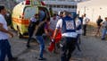 Israeli security forces and medics transport casualties along with local residents, at a site where a reported strike from Lebanon fell in Majdal Shams village in Israel on July 27, 2024. (Photo by Jalaa MAREY / AFP) (Photo by JALAA MAREY/AFP via Getty Images) - Fox News
