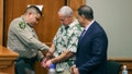 A court officer removes Albert "Ian" Schweitzers handcuffs following the judges decision to release him from prison immediately, after spending more than 20 years in prison, Jan. 24, 2023, in Hilo, Hawaii. A man who was identified as a new suspect in the murder and sexual assault of a woman visiting Hawaii more than three decades ago committed suicide after police took a DNA swab from him, but before he could be arrested, attorneys said in court filings late Sunday, July 28, 2024.. The DNA work represented a major development in a case that was in the headlines last year when Schweitzer, ,a man whod been incarcerated for more than 20 years for the murder, was released based on fresh evidence. - Fox News