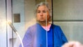 In this screen shot from video of her court appearance, Nancy Crampton Brophy appears in Multnomah County Circuit Court in Portland, Ore., on Thursday, Sept. 6, 2018, on one count of murder with a firearm constituting domestic violence in the June death of her husband, Daniel Brophy, a chef at the Oregon Culinary Institute who was found shot in the school's kitchen. Nancy Brophy is a self-published romance writer who once penned an essay titled "How to Murder Your Husband," The Oregonian/OregonLive reports.
