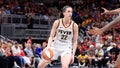 Caitlin Clark #22 of the Indiana Fever dribbles the ball during the game against the Phoenix Mercury on July 12, 2024 at Gainbridge Fieldhouse in Indianapolis, Indiana.