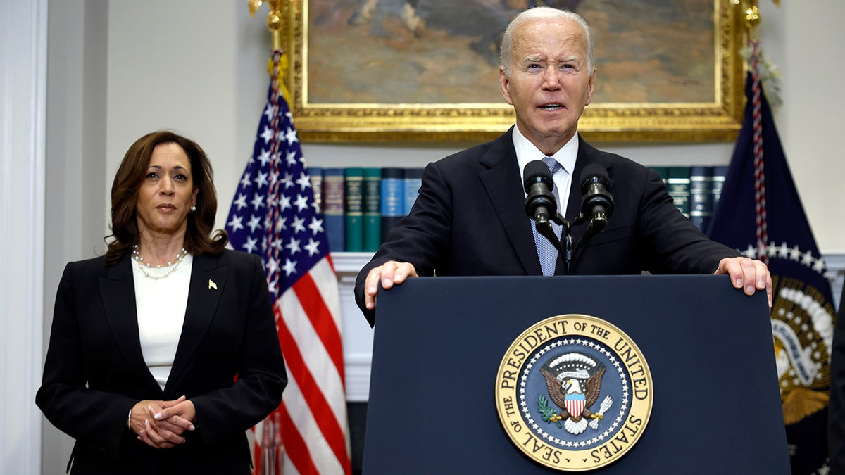 Biden at lectern with Harris behind him to his right