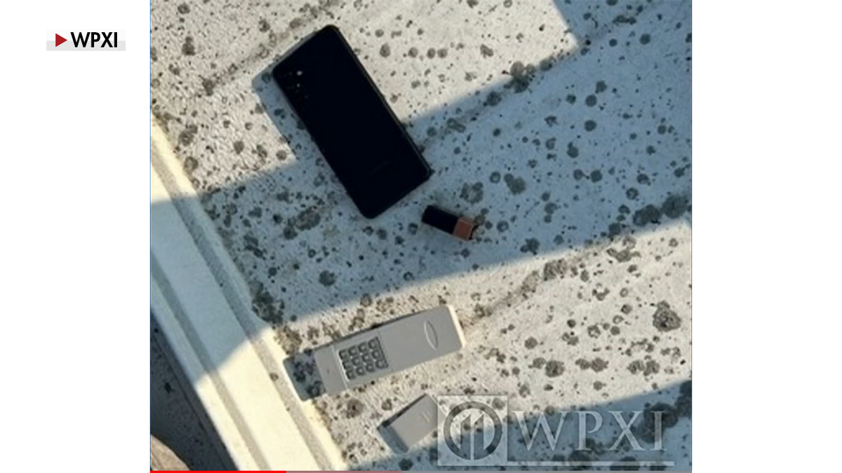 Transitter and cell phone on roof.