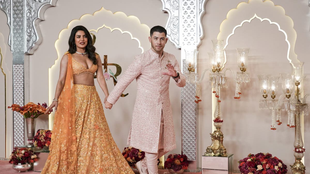 priyanka chopra and nick jonas at indian wedding walking