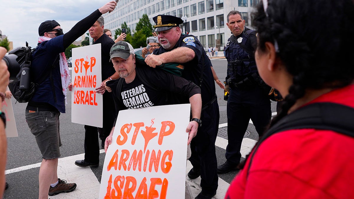 DC officers confront anti-Israel protesters blocking street