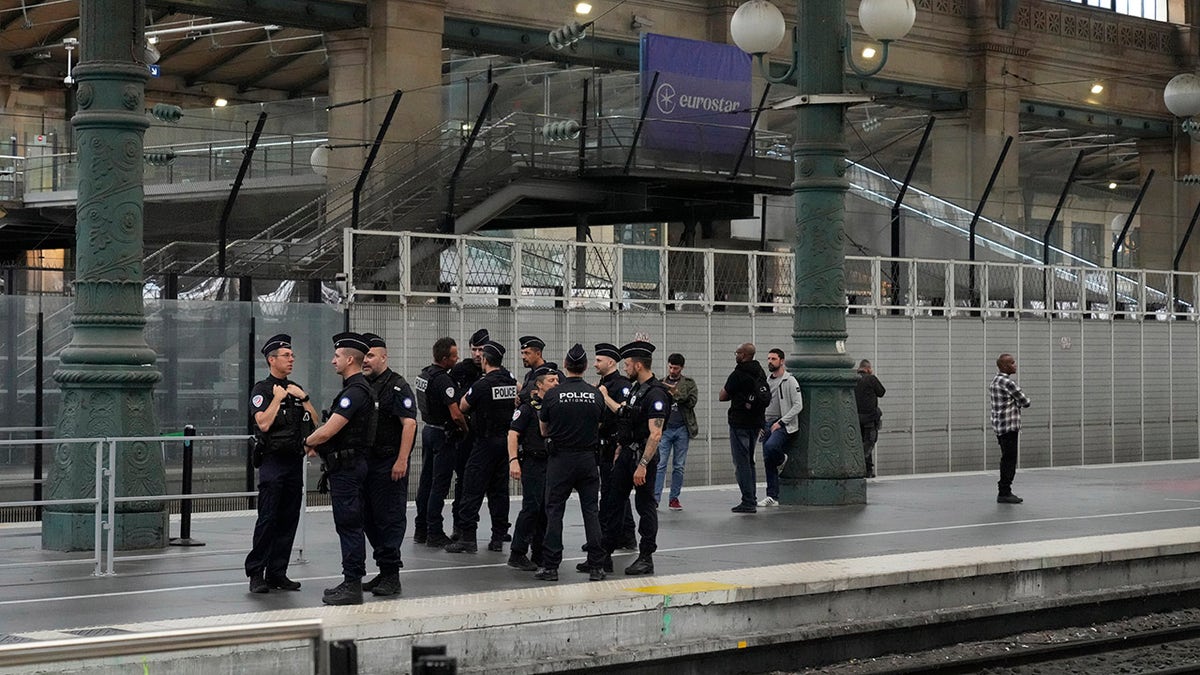 French police inside a train station