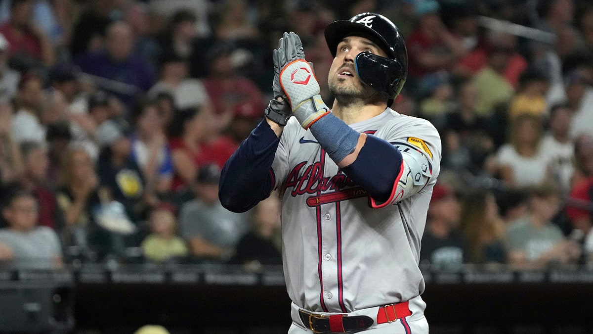 Adam Duvall celebrates the home run