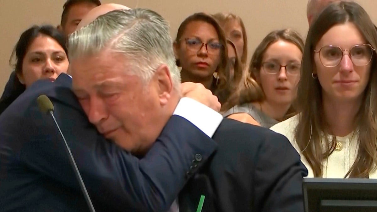 Alec Baldwin reacts after the judge threw out the involuntary manslaughter case