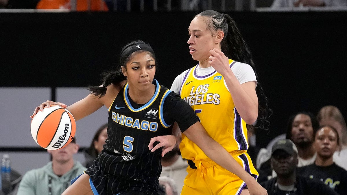 Angel Reese backs down a Sparks player