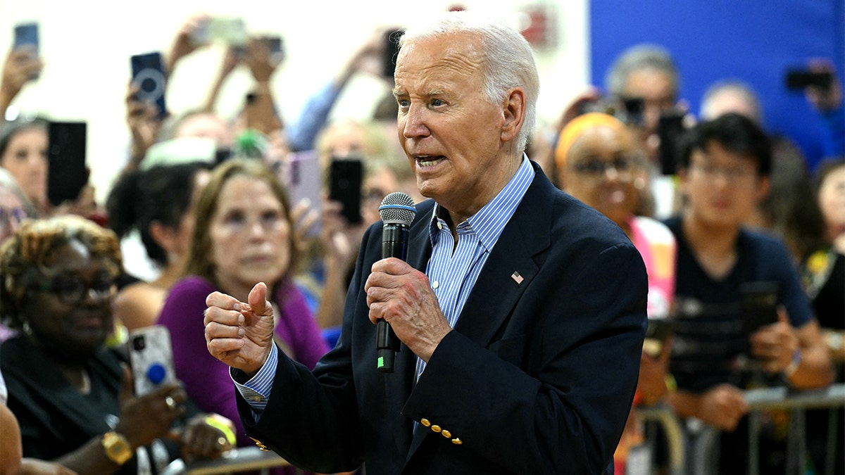 Biden giving a speech at a campaign rally.