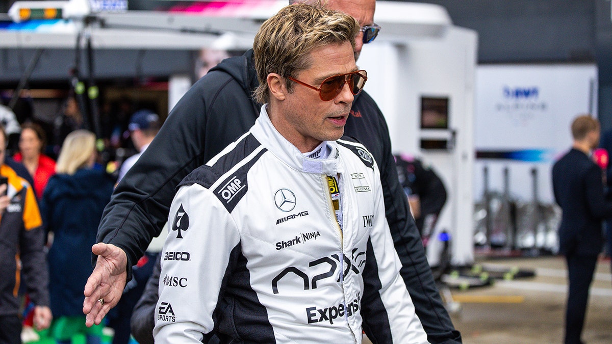 Brad Pitt in a racing suit