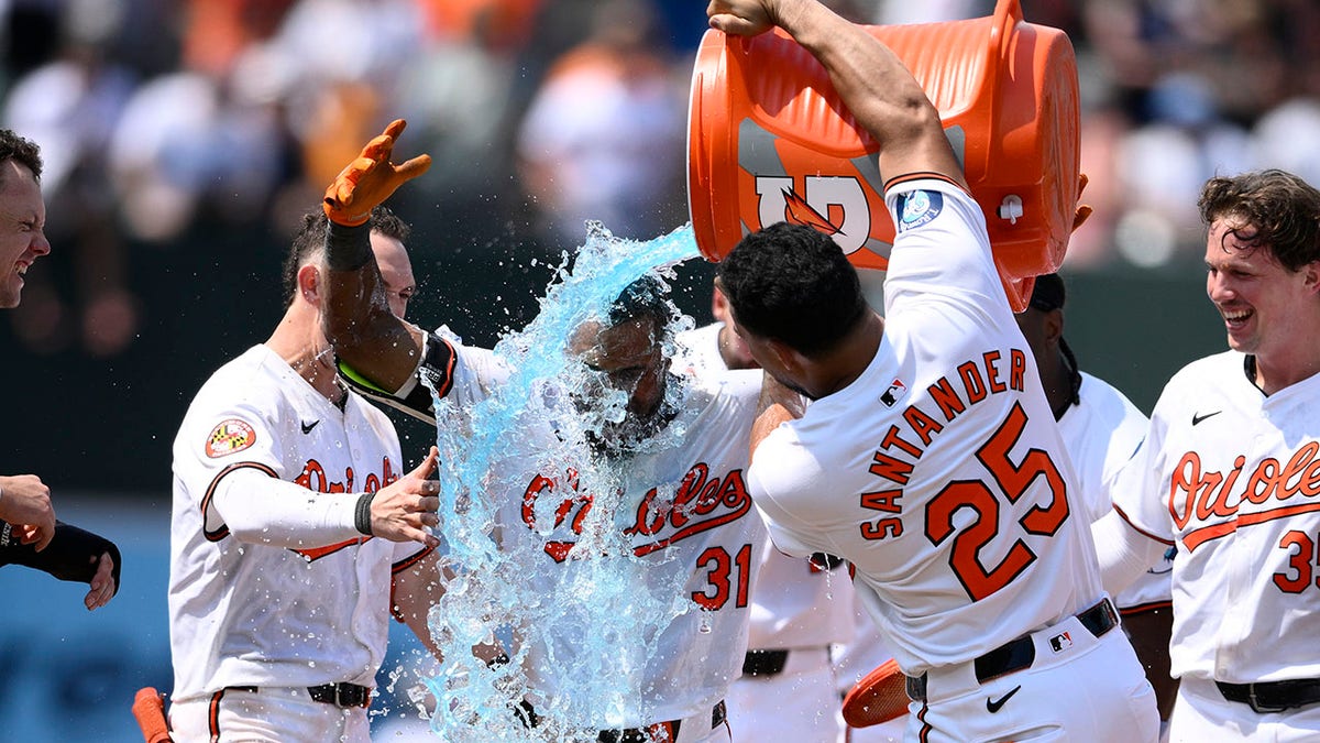 Cedric Mullins gets a Gatorade bath