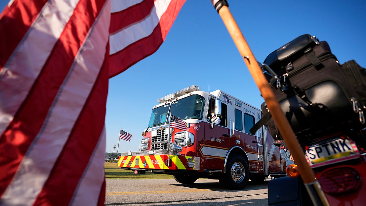 The funeral procession for Corey Comperatore passes