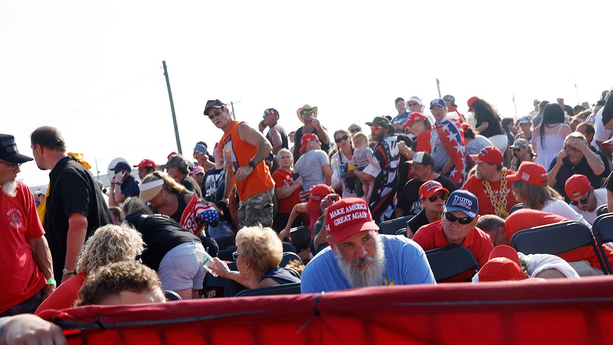 crowd ducks after shots fired at Trump rally