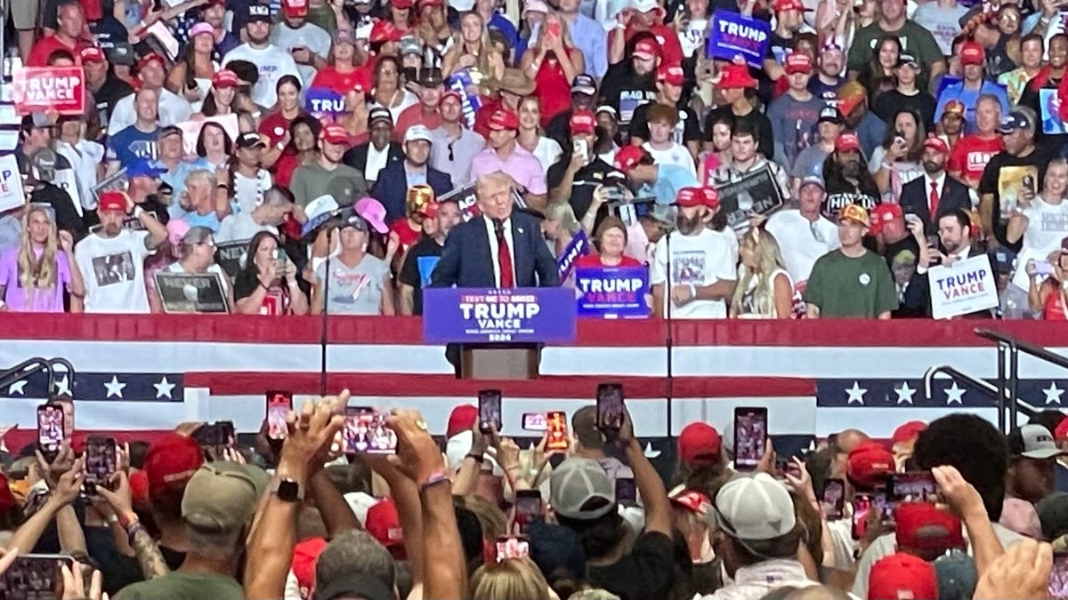 Former President Donald Trump criticizes Vice President Kamala Harris at a rally in North Carolina