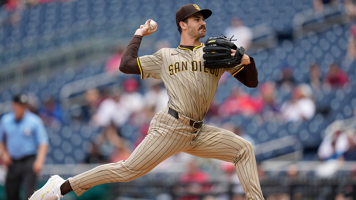 Dylan Cease throws a pitch from the mound