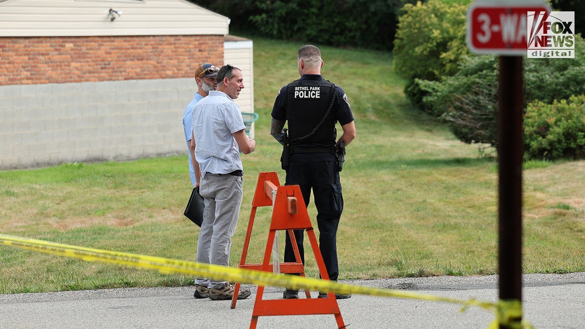 Men who appear to be FBI agents in Bethel Park.