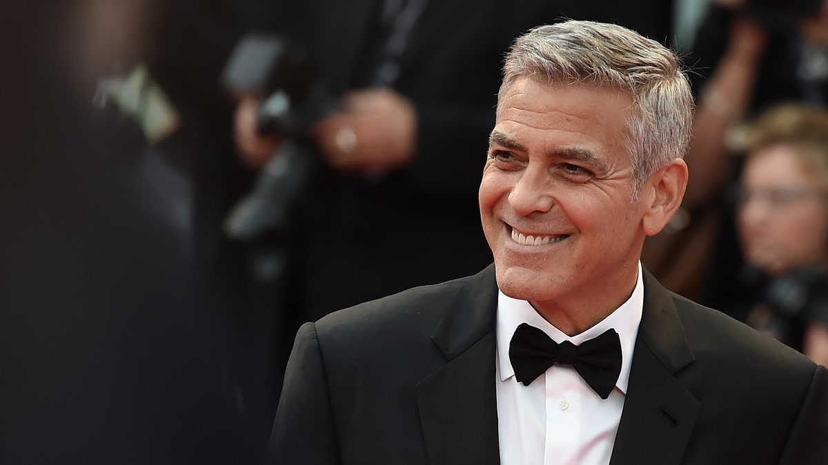 George Clooney smiling in a tuxedo