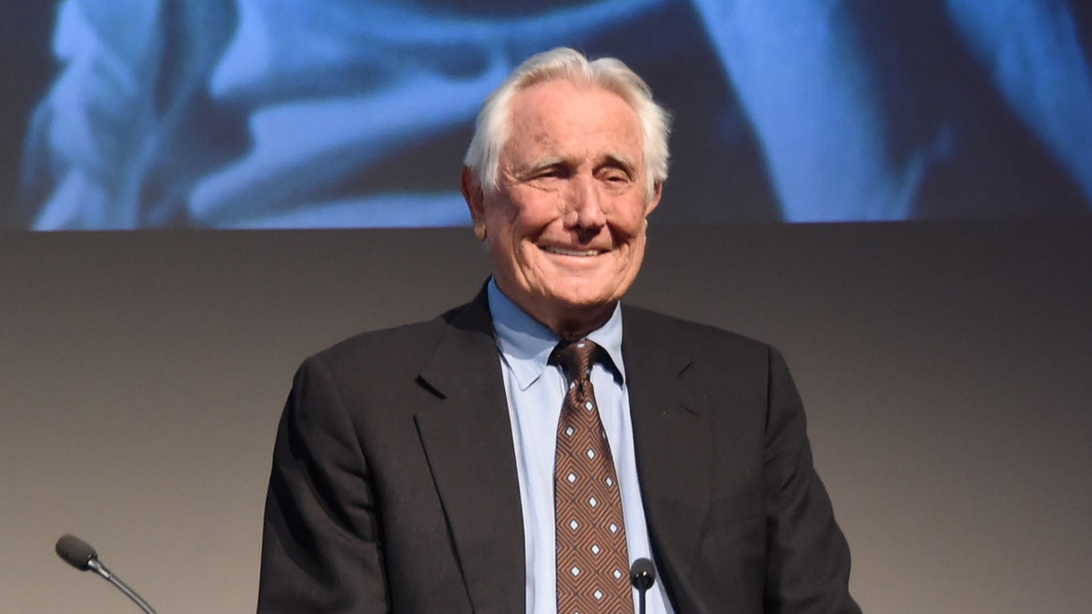 George Lazenby attends a screening