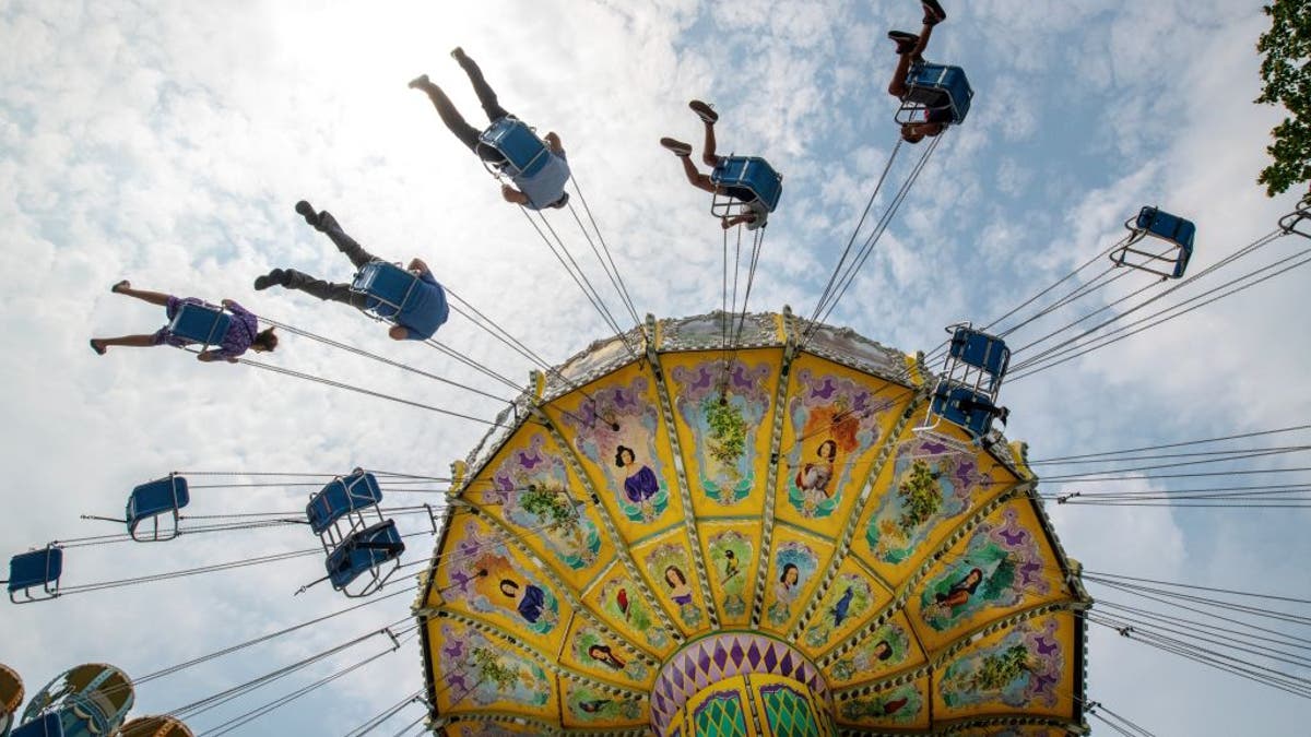 Paseo en columpio en Adventureland, Long Island, Nueva York