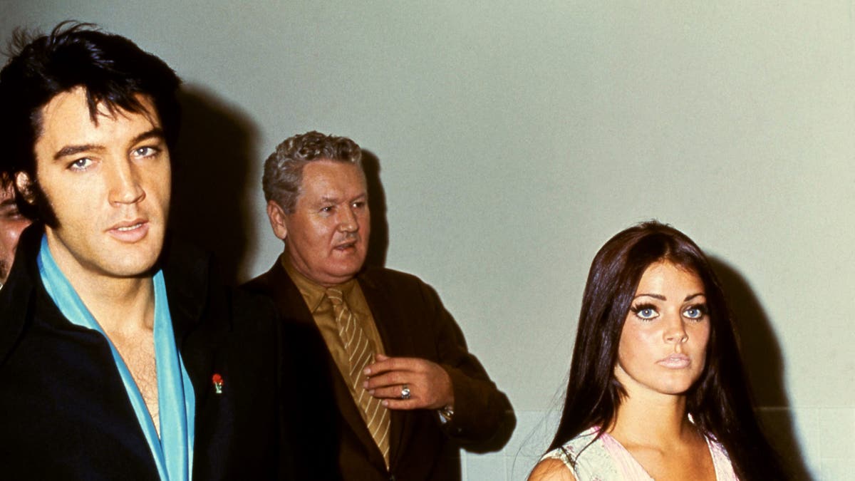 Elvis Presley with Priscilla Presley and Elvis Sr. Vernon