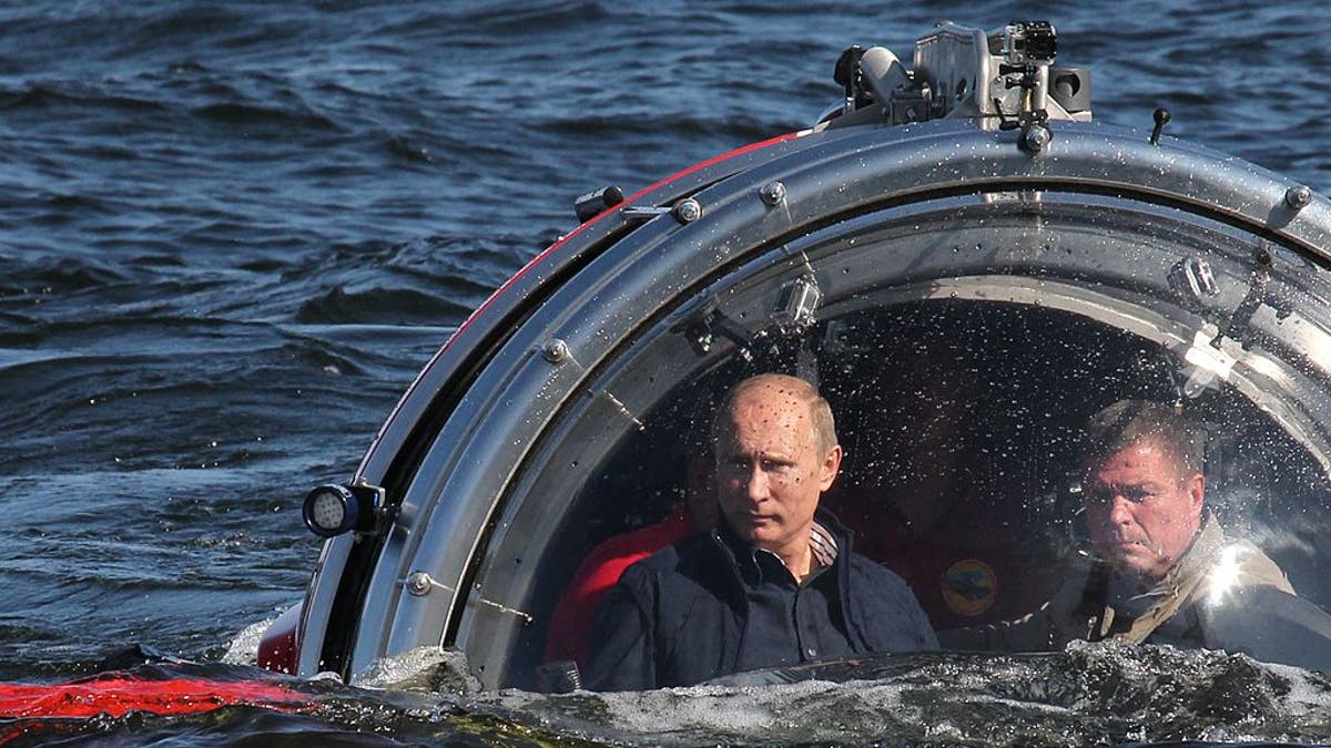 Russian President Vladimir Putin rides in a submersible in the Baltic Sea near Gotland Island, Russia, on July 15, 2013.