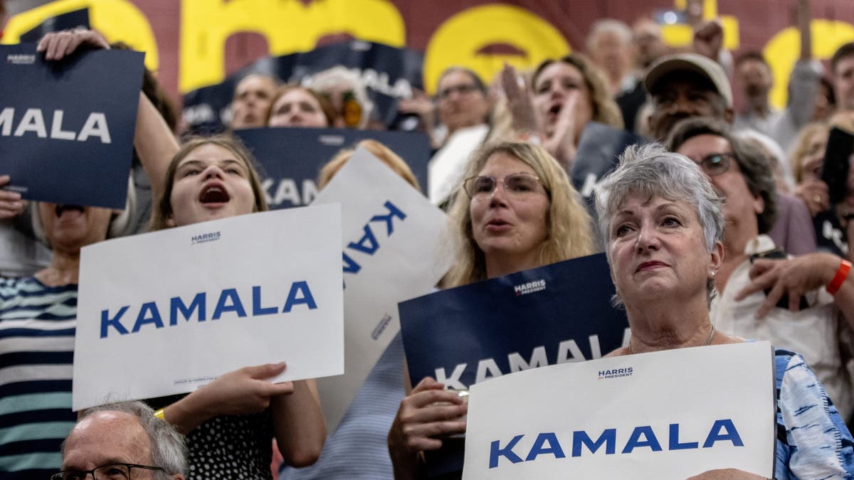 Supporters of Vice President Kamala Harris react to her speaking during a campaign rally at West Allis Central High School on July 23, 2024 in West Allis, Wisconsin. Harris made her first campaign appearance as the party's presidential candidate, with an endorsement from President Biden. (Photo by Jim Vondruska/Getty Images)
