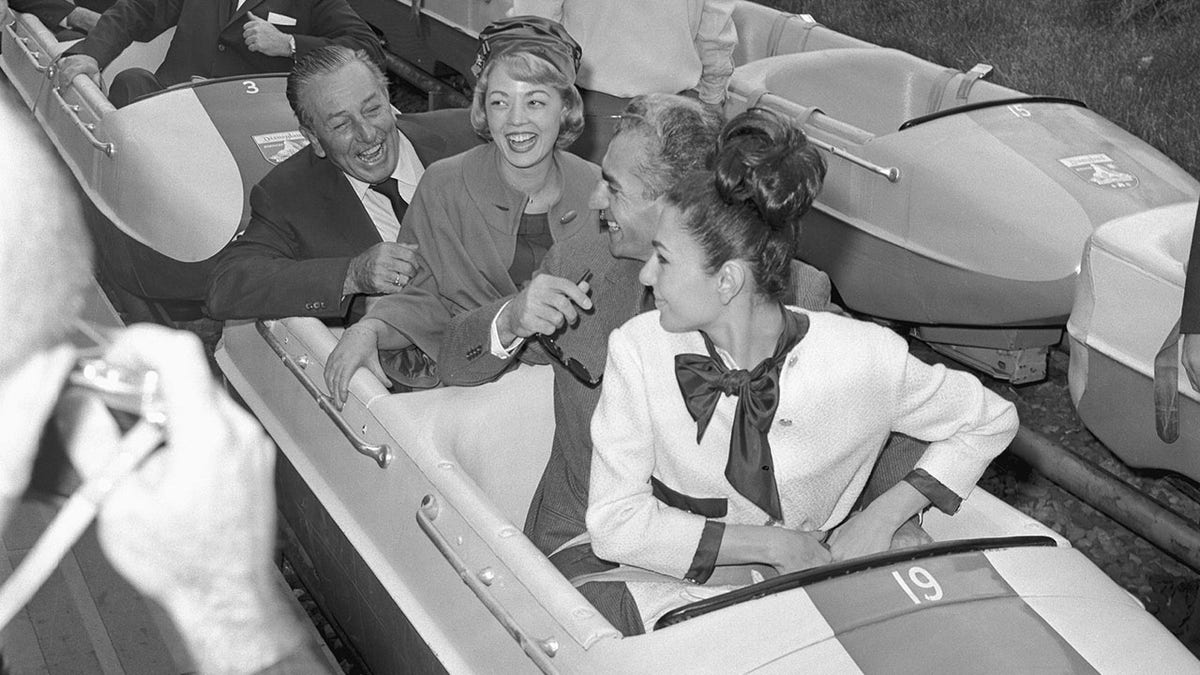 Walt Disney on the Matterhorn with the Shah of Iran and his wife.