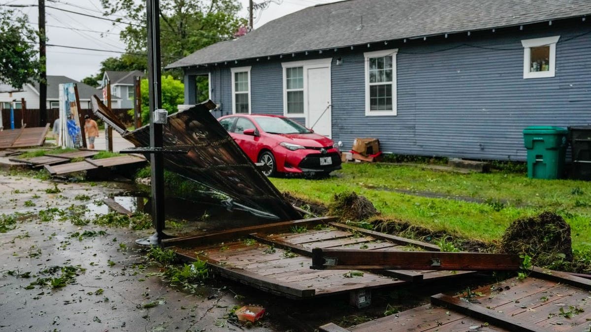 Debris next to house in Houston