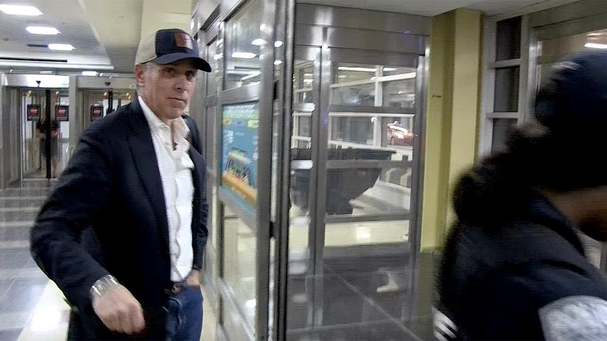 Hunter Biden arrives at Reagan National Airport in Arlington, Virginia, on Tuesday.