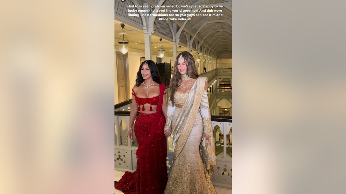 Kim and Khloe Kardashian at an Indian wedding