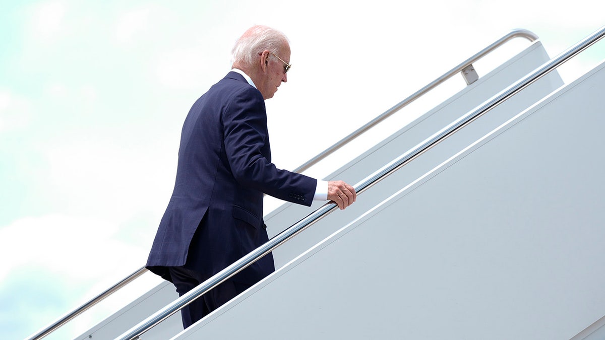 President Joe Biden boards Air Force One at Dover Air Force Base