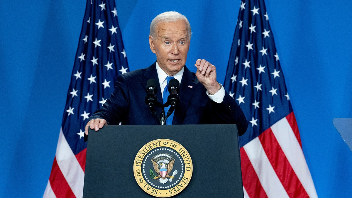 Joe Biden at podium at news conference