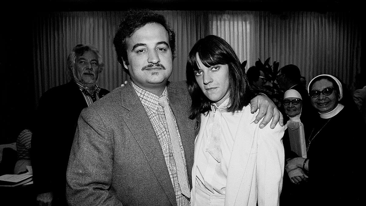 Black and white photo of John Belushi and Judy Belushi