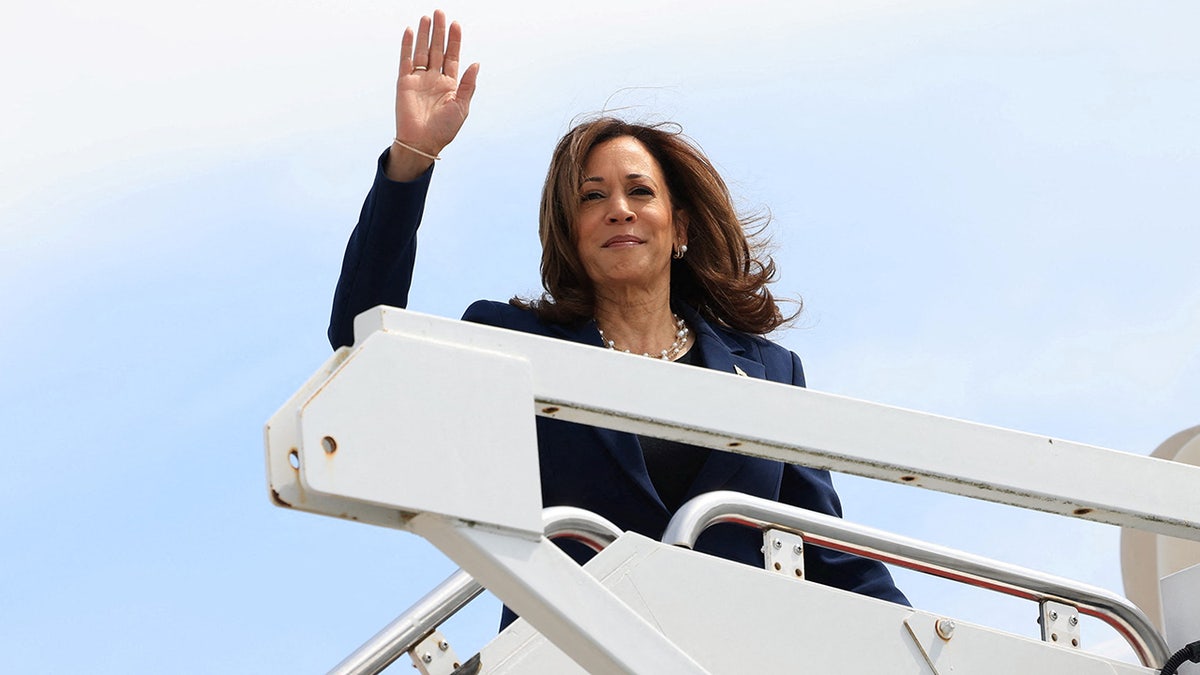Kamala Harris disembarks Air Force Two as she arrives to campaign in Milwaukee, Wisconsin