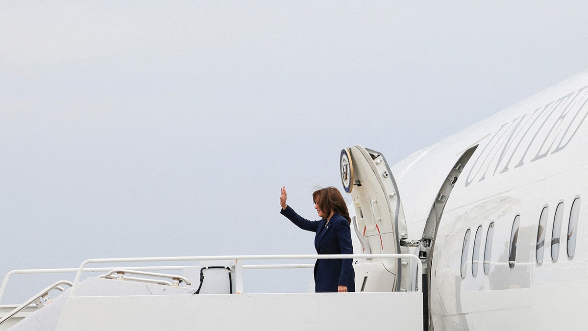 Kamala Harris disembarks Air Force Two as she arrives to campaign in Milwaukee, Wisconsin