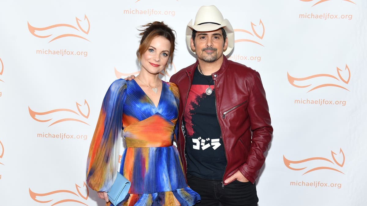 Brad Paisley and Kimberly Williams-Paisley pose at an event