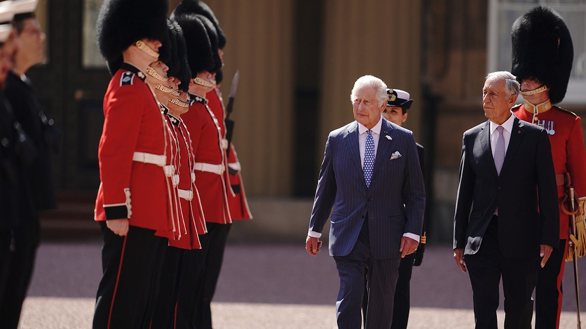 King Charles III and President of Portugal, Marcelo Rebelo de Sousa, inspect the Buckingham Palace detachment of the King's Guard during the president's visit to the UK to mark the 650th Anniversary of the Anglo-Portuguese Alliance on June 15, 2023 in London, England.