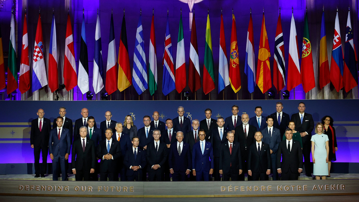 NATO heads of state posing for group photo