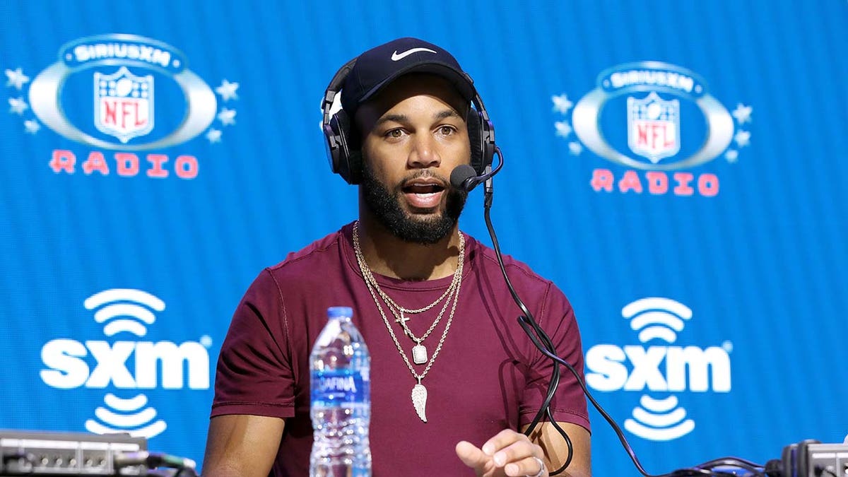 Golden Tate speaks on stage