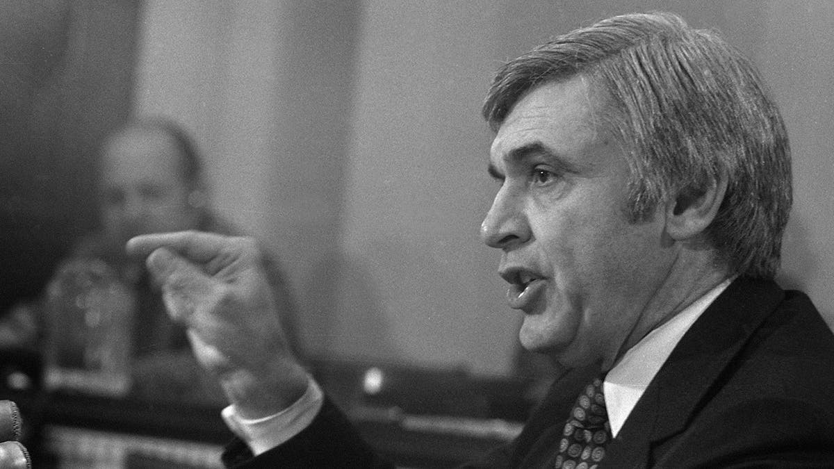 Leo Ryan speaking in congress and pointing his finger.