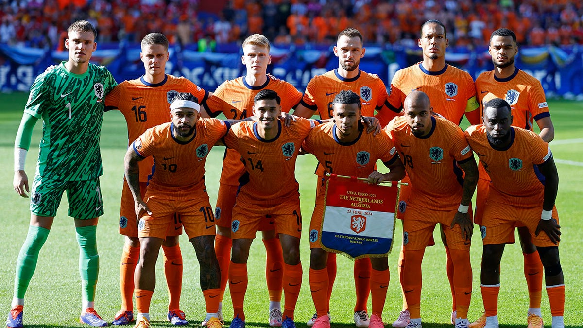 Het Nederlands elftal maakt een foto