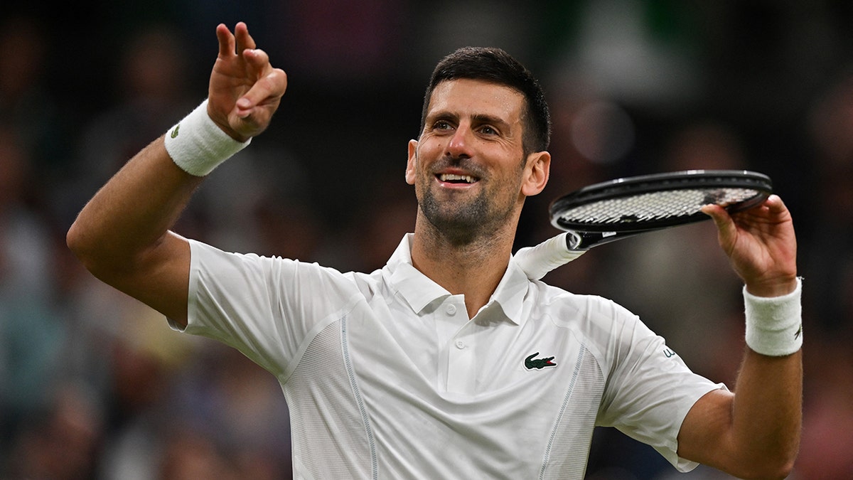 Novak Djokovic celebrates the match he won