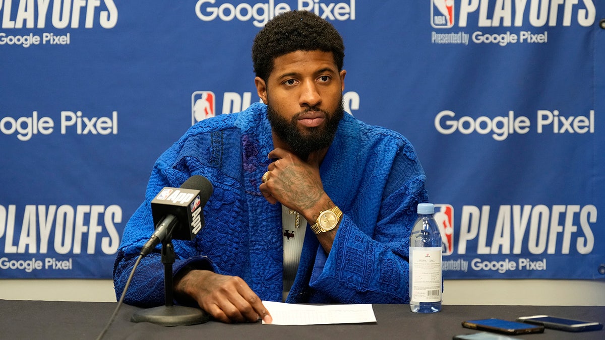 Paul George at a press conference