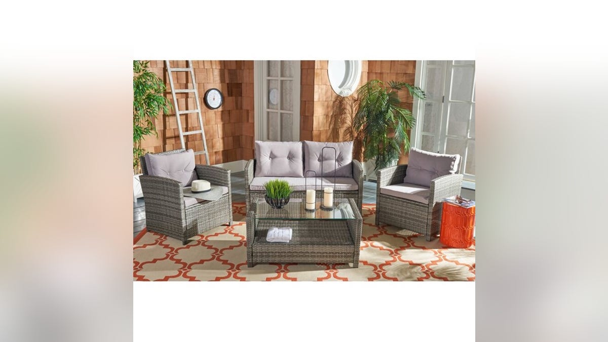 Lounge comfortably outside with a patio furniture set. 