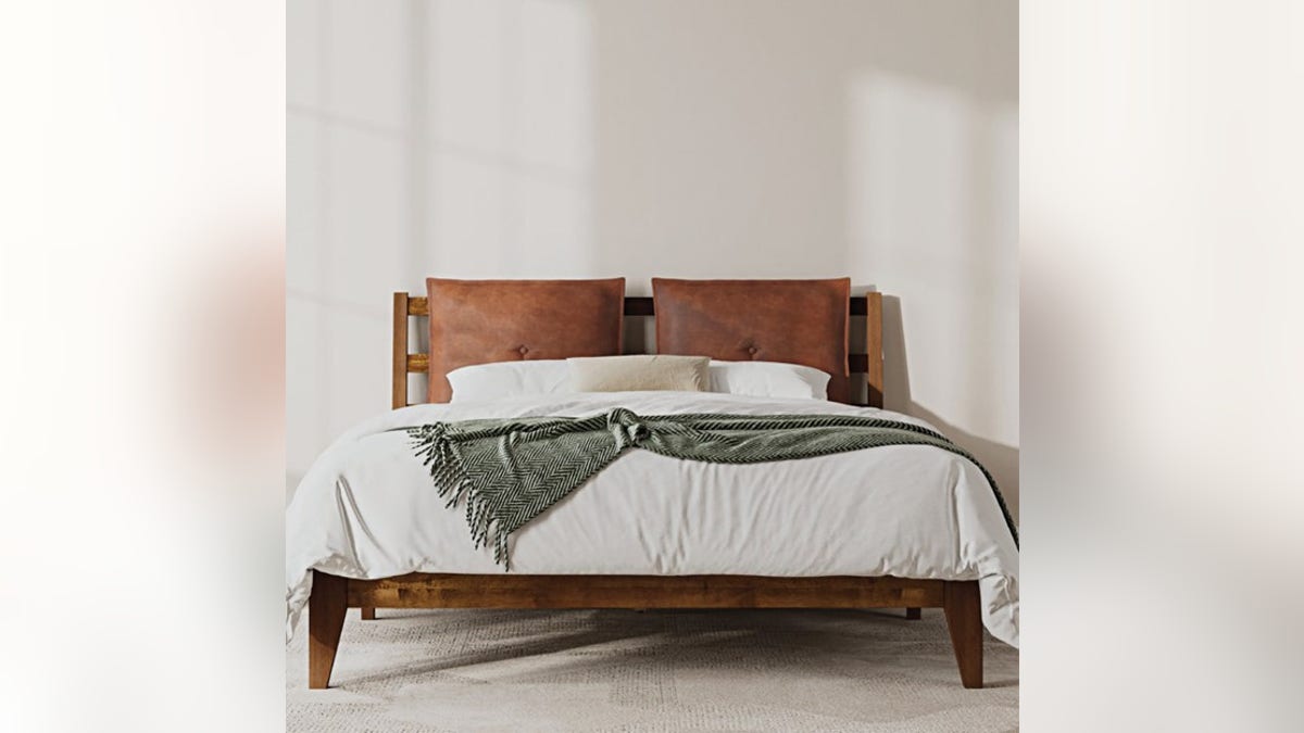 Sleep in style with this wood bed frame. 