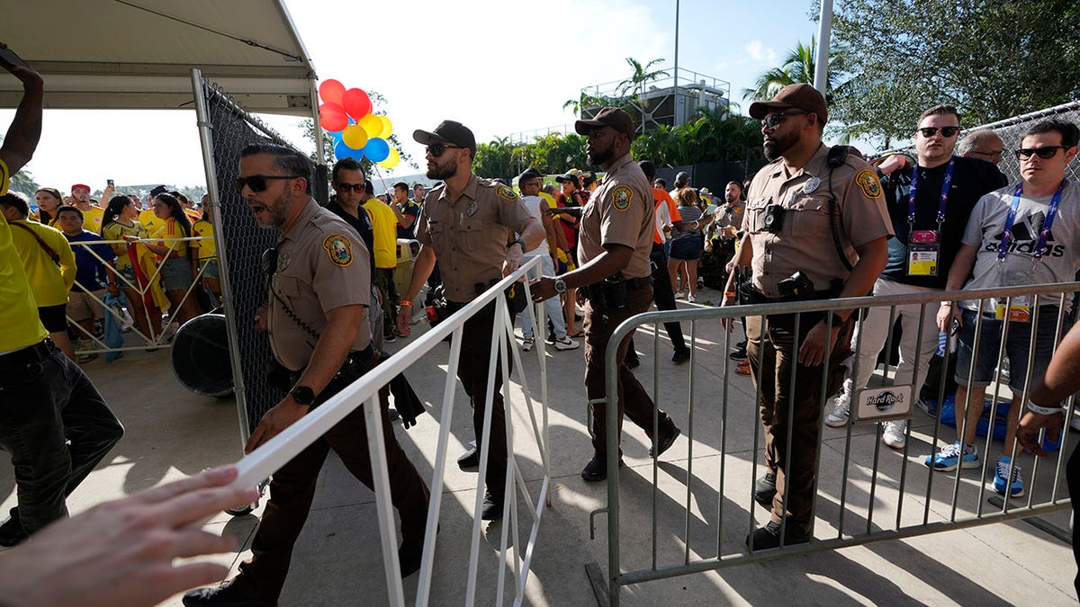 Police enter the security zone