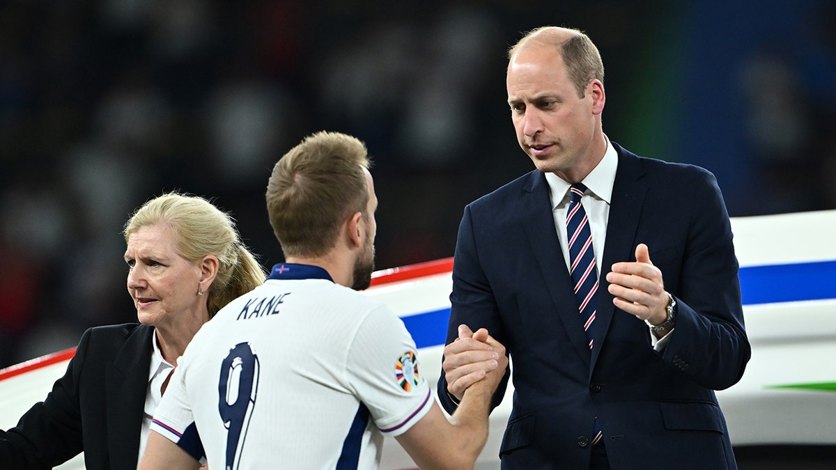 Prince William shakes hands with player Harry Kane of England after the team's loss to Spain in the Euro Final.