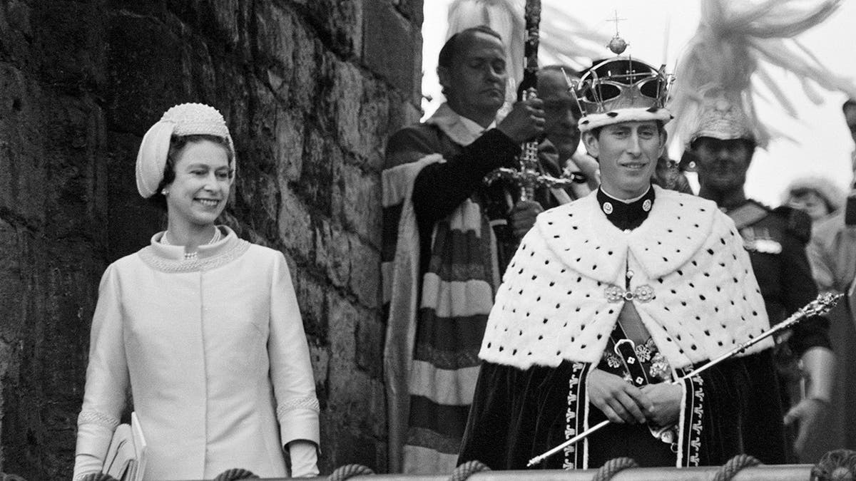 Queen Elizabeth II and then Prince Charles, Prince of Wales in black and white photo