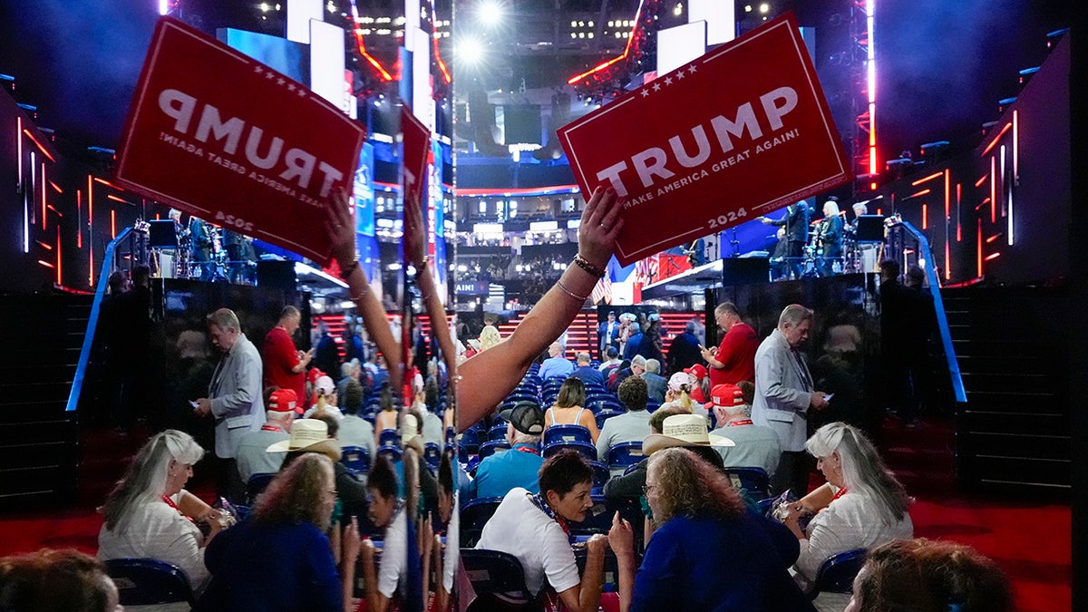 A supporter holds a sign during the Republican National Convention